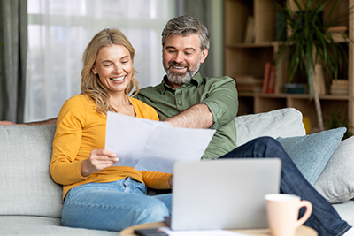 couple looking a paperwork